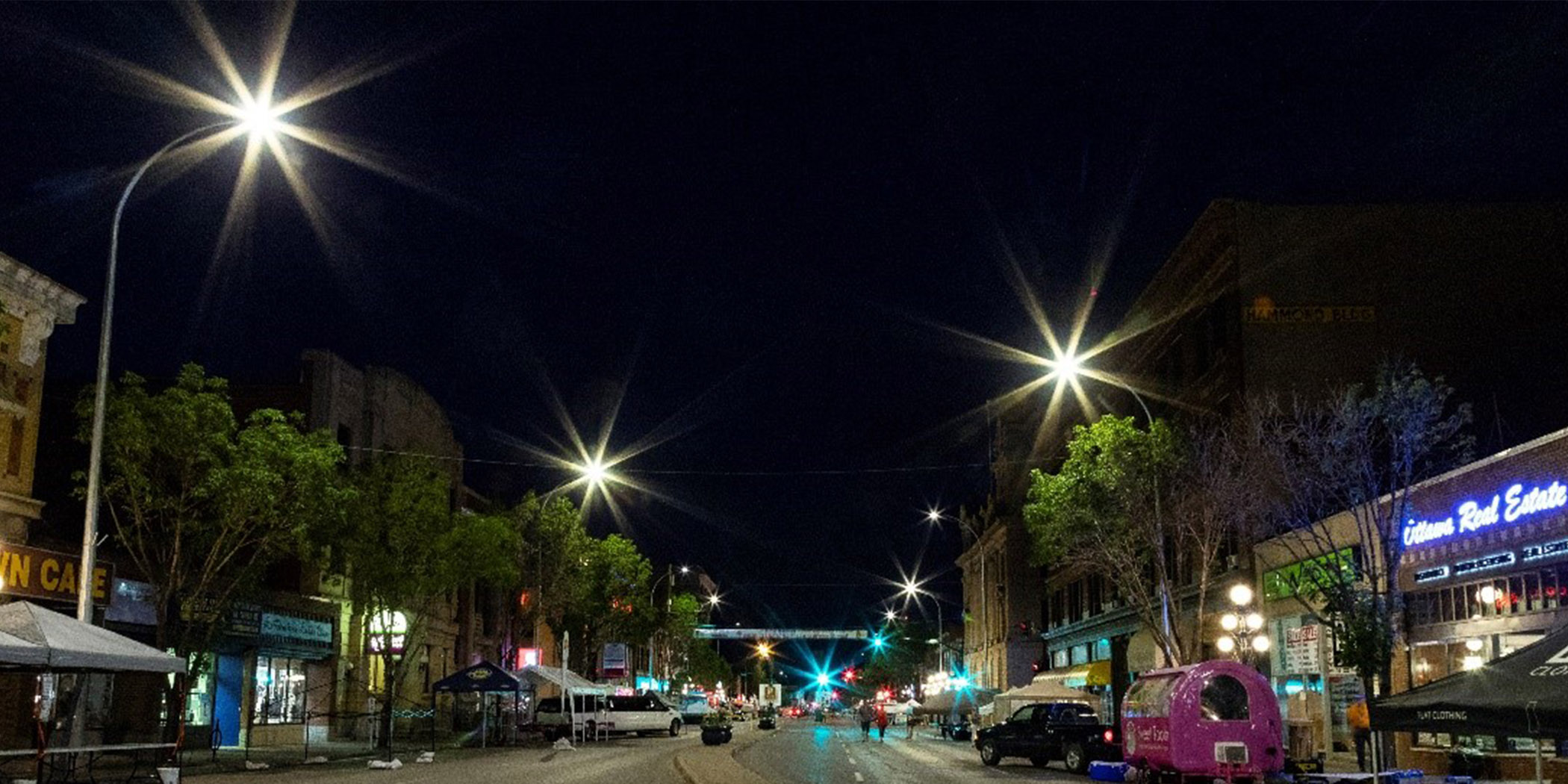 LED streetlights shiny bright over a city street