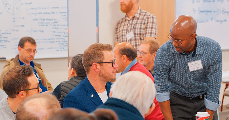 people talking at an event
