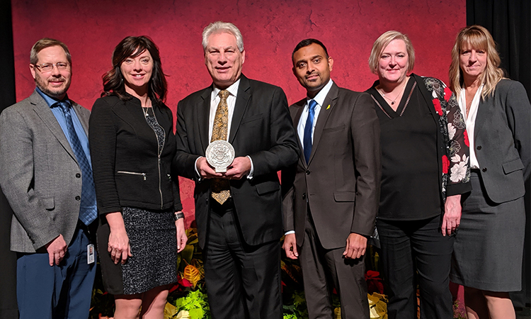SaskPower Group Accepting Award