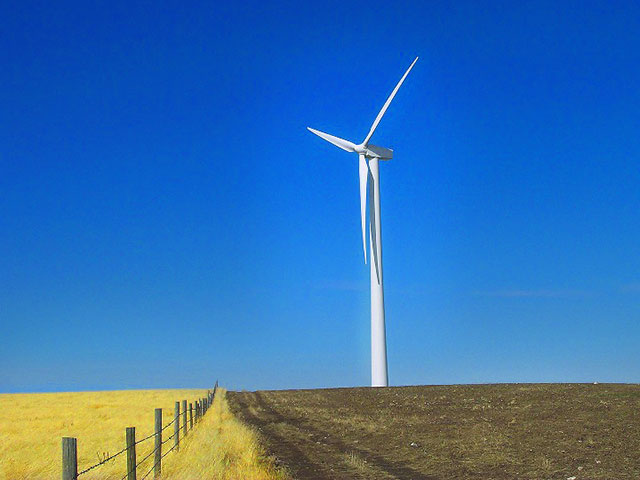 Wind turbine in field