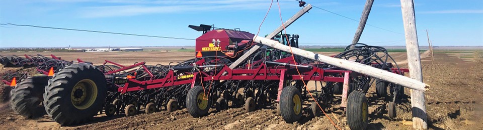 tractor contacted with a power pole